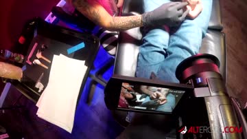 Evilyn Ink fucks Sascha after giving him a tattoo