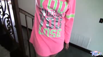 Shaved teen masturbates solo