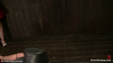 Hot blonde in device bondage fisted