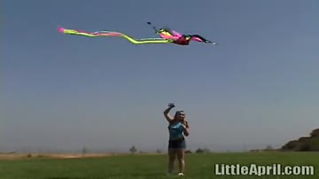 Cute Little April Outdoors Sucking A Popsicle