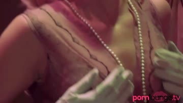 Glamorous busty lesbians in boutique