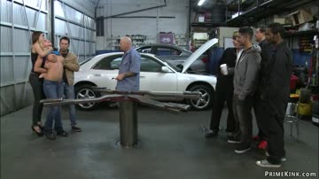 Bound blonde fucked in car body shop