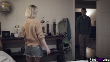 Blonde stepmom helping her stepson eases the pain