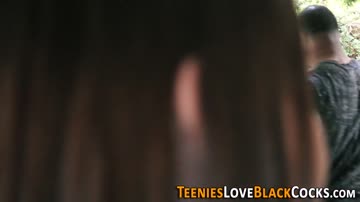 Brunette teen gobbles huge black dick