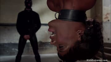 Ebony sub in ankle suspension fucked