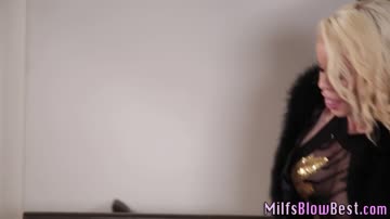 Busty milf gives head and strokes