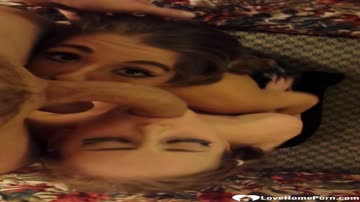 Two hot babes giving a lucky man blowjob