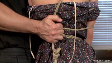 Slim blonde is anal toyed in hogtie