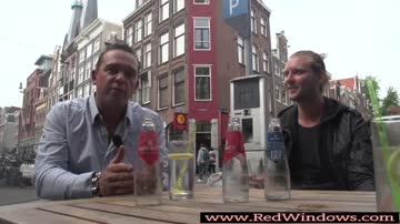 Dutch prostitute sucks tourist at red lights