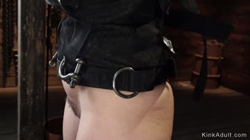 Hot brunette in grueling device bondage