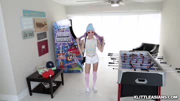 Asian petite teen bends over bends over on the foosball table to take a big baseball bat dick