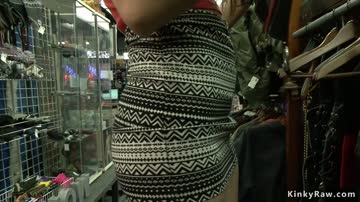 Slut wearing leather in public shop